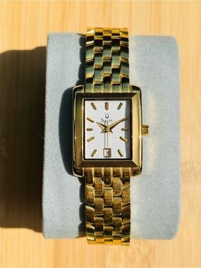 Bulova Gold Tone White Pattern Dial Date Quartz Watch Analog Water Resistant